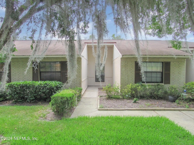 view of front of home with a front yard