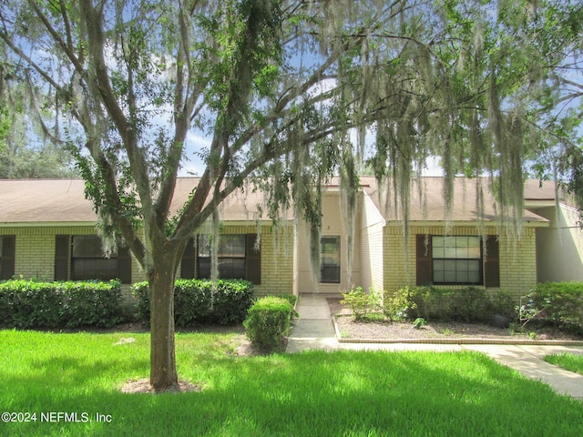 view of front of home with a front yard