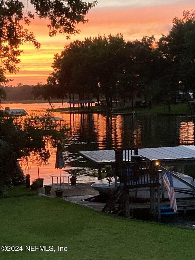 view of dock with a water view