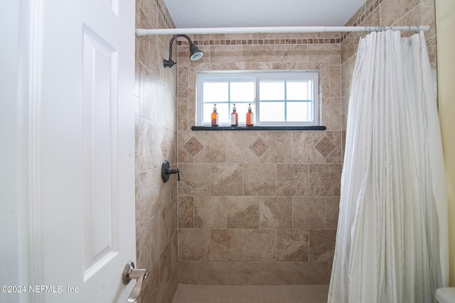 bathroom featuring walk in shower