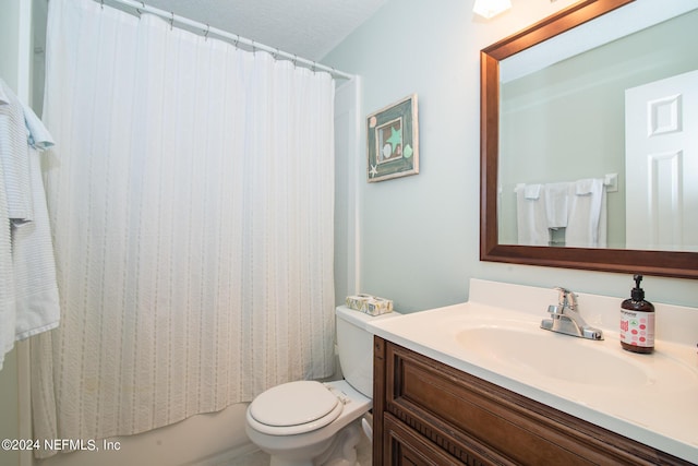 full bathroom featuring vanity, toilet, and shower / tub combo