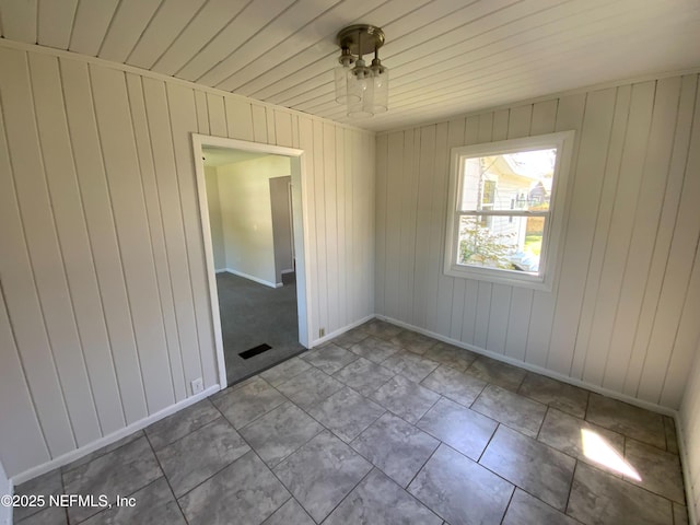 empty room with baseboards