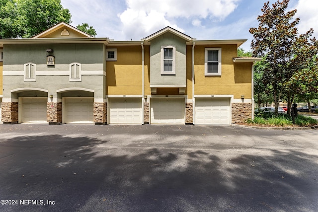 view of property with a garage