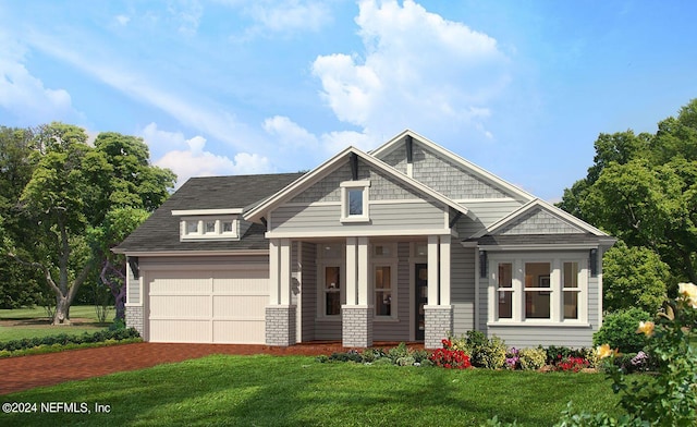 craftsman-style home with decorative driveway, brick siding, and a front lawn