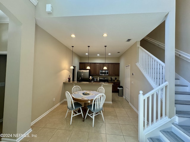 dining room with light tile patterned floors