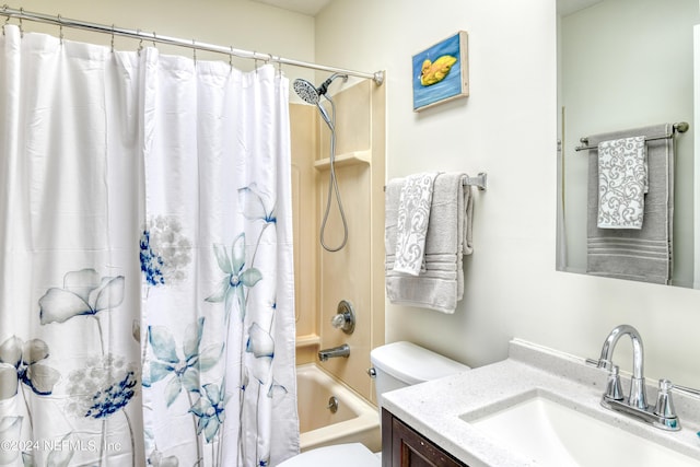 full bathroom with shower / tub combo, vanity, and toilet