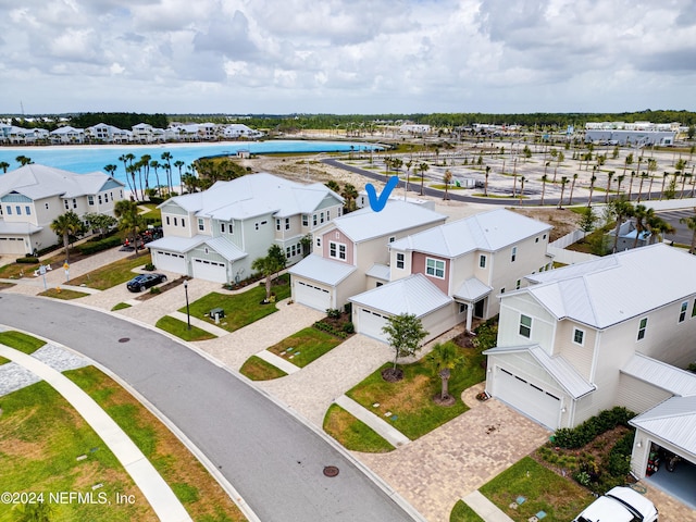 aerial view featuring a water view