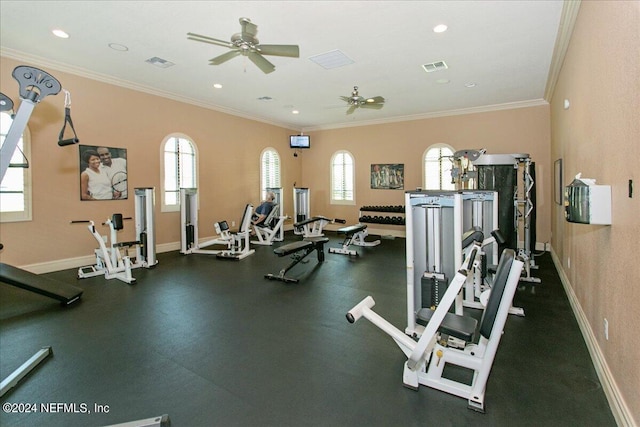 gym featuring ceiling fan, crown molding, and a healthy amount of sunlight