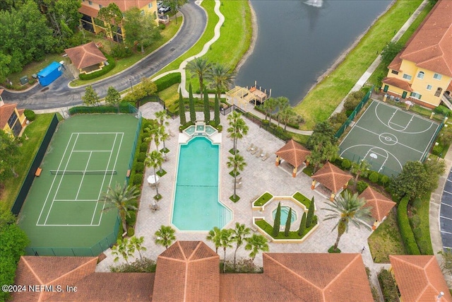 birds eye view of property featuring a water view