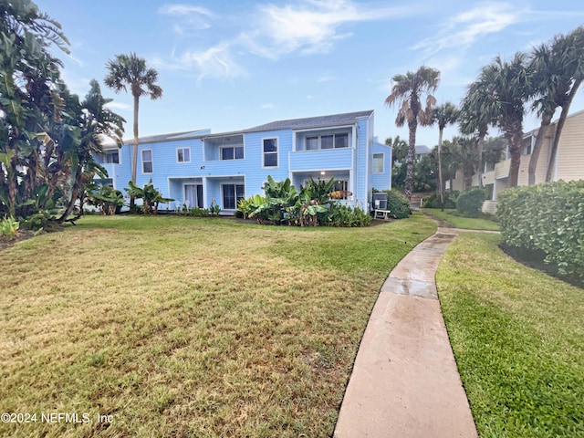 6300 A1A S Unit A74D, Saint Augustine, FL 32080 - view of front of home featuring a front lawn