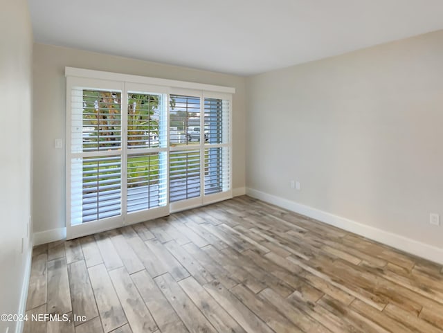 empty room featuring light hardwood / wood-style flooring