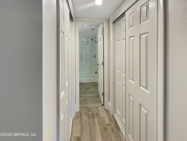 hall featuring light hardwood / wood-style floors