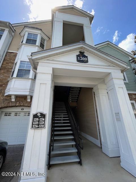 property entrance featuring a garage