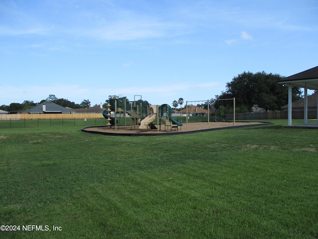 view of play area with a yard