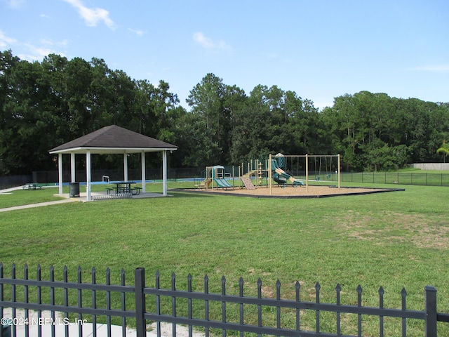 view of jungle gym featuring a gazebo and a lawn