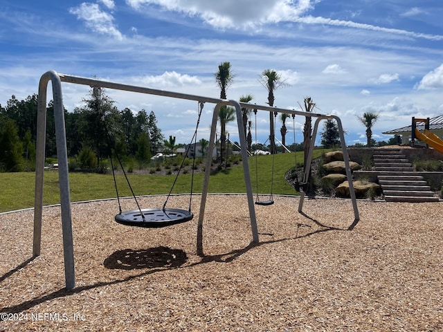 view of jungle gym with a yard