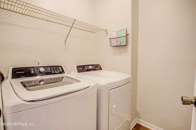 laundry room featuring independent washer and dryer