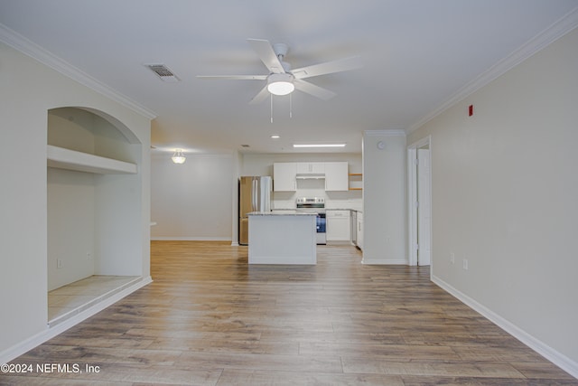 unfurnished living room with crown molding, ceiling fan, and light hardwood / wood-style floors