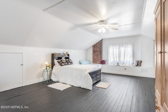 bedroom featuring lofted ceiling, ceiling fan, and dark wood-type flooring