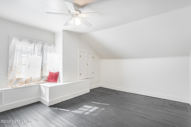 additional living space featuring ceiling fan, dark hardwood / wood-style floors, and lofted ceiling