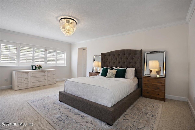 carpeted bedroom featuring ornamental molding, a textured ceiling, and a chandelier