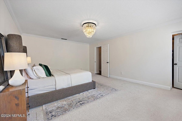 carpeted bedroom featuring a textured ceiling, an inviting chandelier, and crown molding