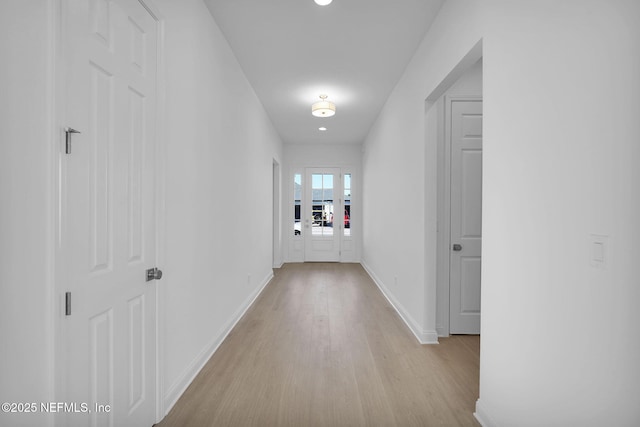 corridor featuring light wood-type flooring