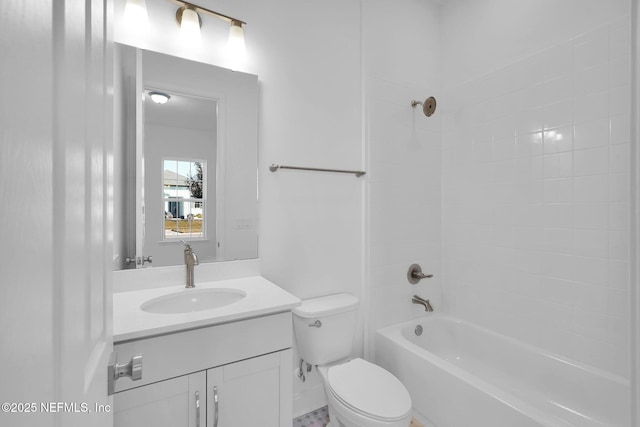 full bathroom with toilet, vanity, and washtub / shower combination