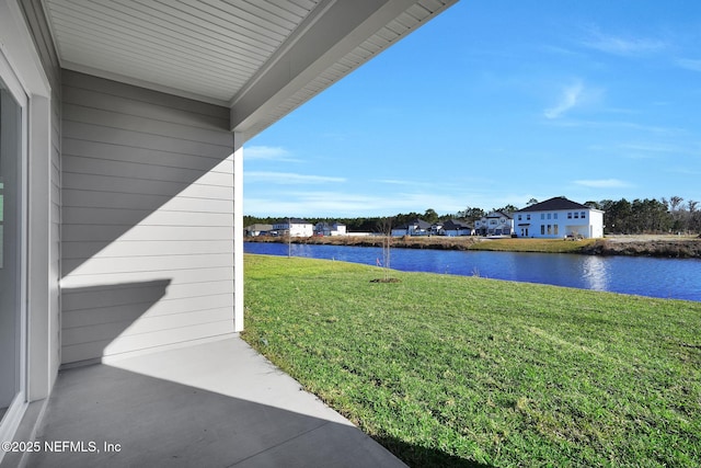 view of yard with a water view