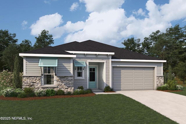 view of front of home with a garage and a front lawn