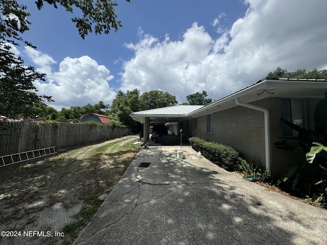 view of yard with a carport