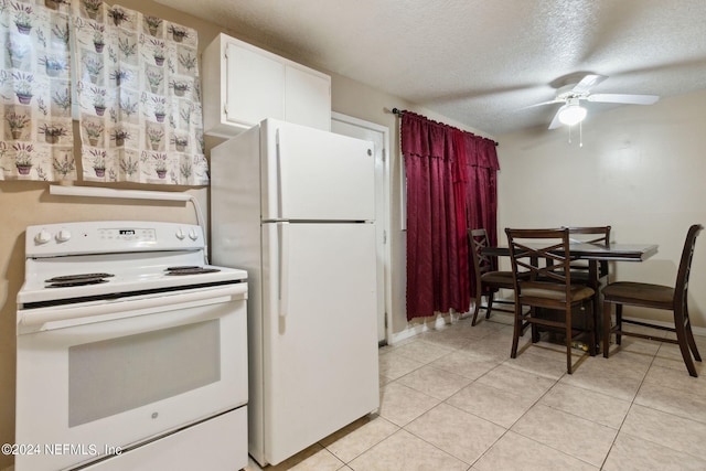 kitchen with white cabinetry, white appliances, light tile patterned floors, a textured ceiling, and ceiling fan