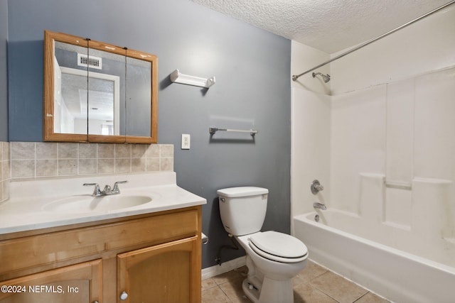 full bathroom with vanity, toilet, backsplash, shower / bathtub combination, and tile patterned flooring