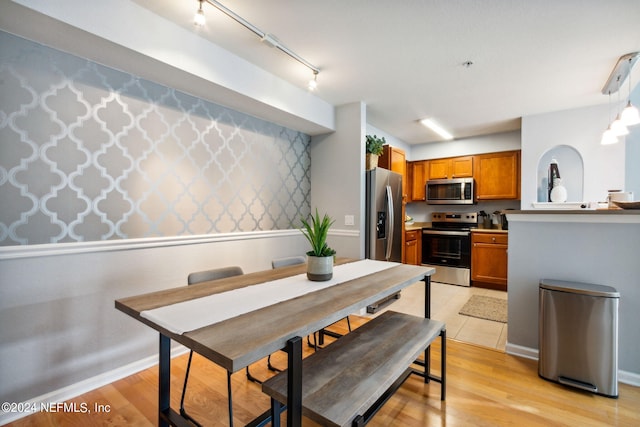 dining room featuring light hardwood / wood-style flooring