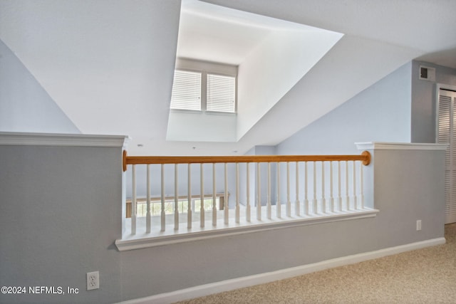 hallway featuring carpet
