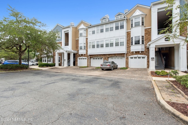 view of property with a garage