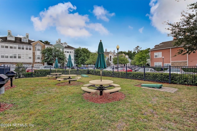 view of community featuring a lawn