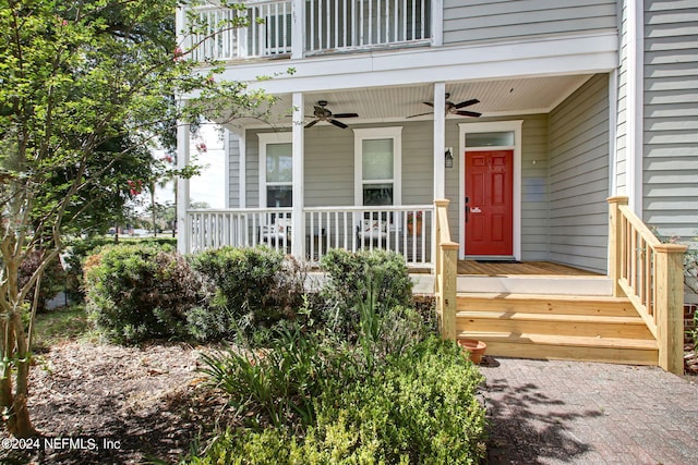 doorway to property featuring ceiling fan and a balcony