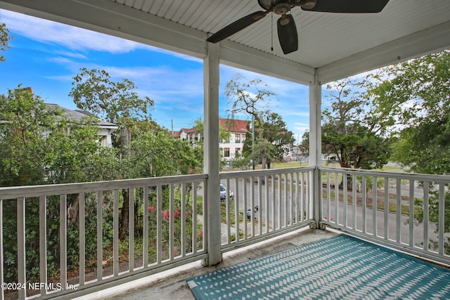 exterior space with ceiling fan