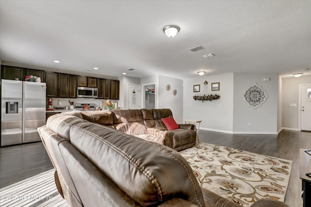 living room with dark wood-type flooring