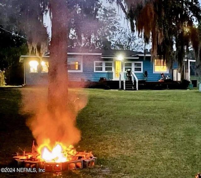 exterior space featuring a fire pit