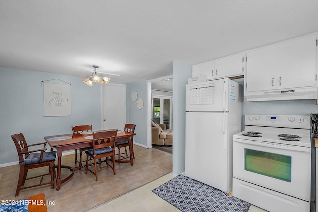 kitchen with an inviting chandelier, white appliances, and white cabinets