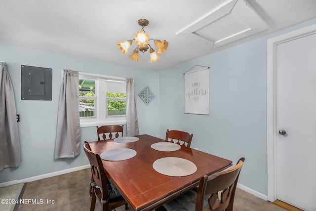 dining room with a notable chandelier and electric panel