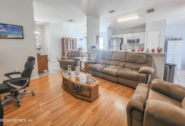 living room with light hardwood / wood-style floors