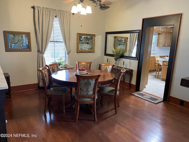 dining space featuring hardwood / wood-style flooring