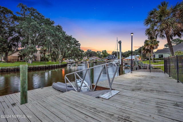 dock area with a water view