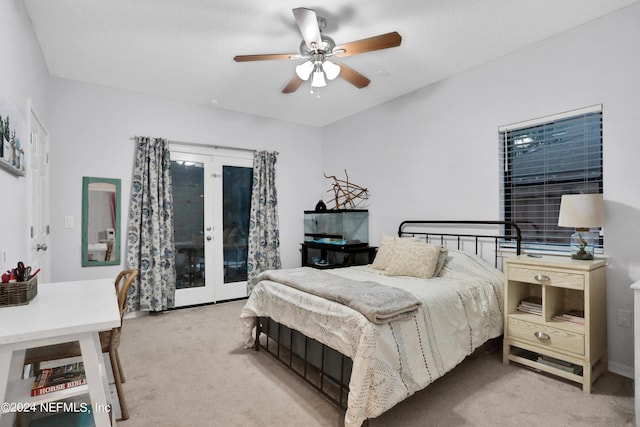 bedroom featuring carpet, access to outside, a ceiling fan, and french doors