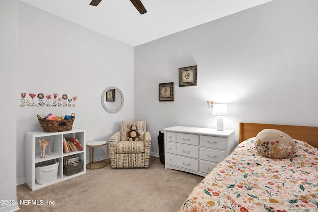 bedroom with light carpet, ceiling fan, and baseboards