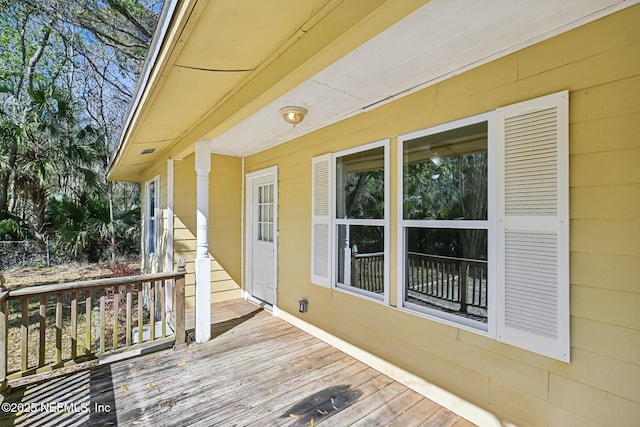 wooden deck featuring covered porch