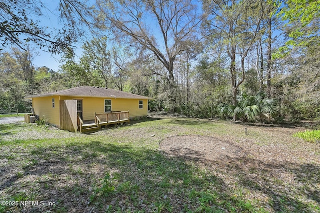 view of yard featuring a deck